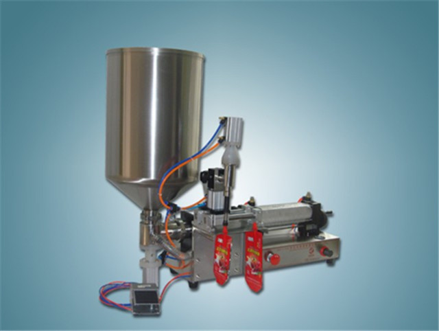 single head tabletop standup pouch filler with hopper.jpg